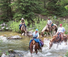 River crossing on horse pack trip in Wyoming
